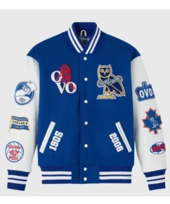 Material: Wool Body With Leather Sleeves Collar: Striped Rib-Knit Sleeves: Full-Length Cuffs: Striped Rib-Knit Pockets: Two Waist Pockets Hem: Striped Rib-Knit Closure: Front Snap-Tab Button Color: Royal Blue With Multicolor Designs